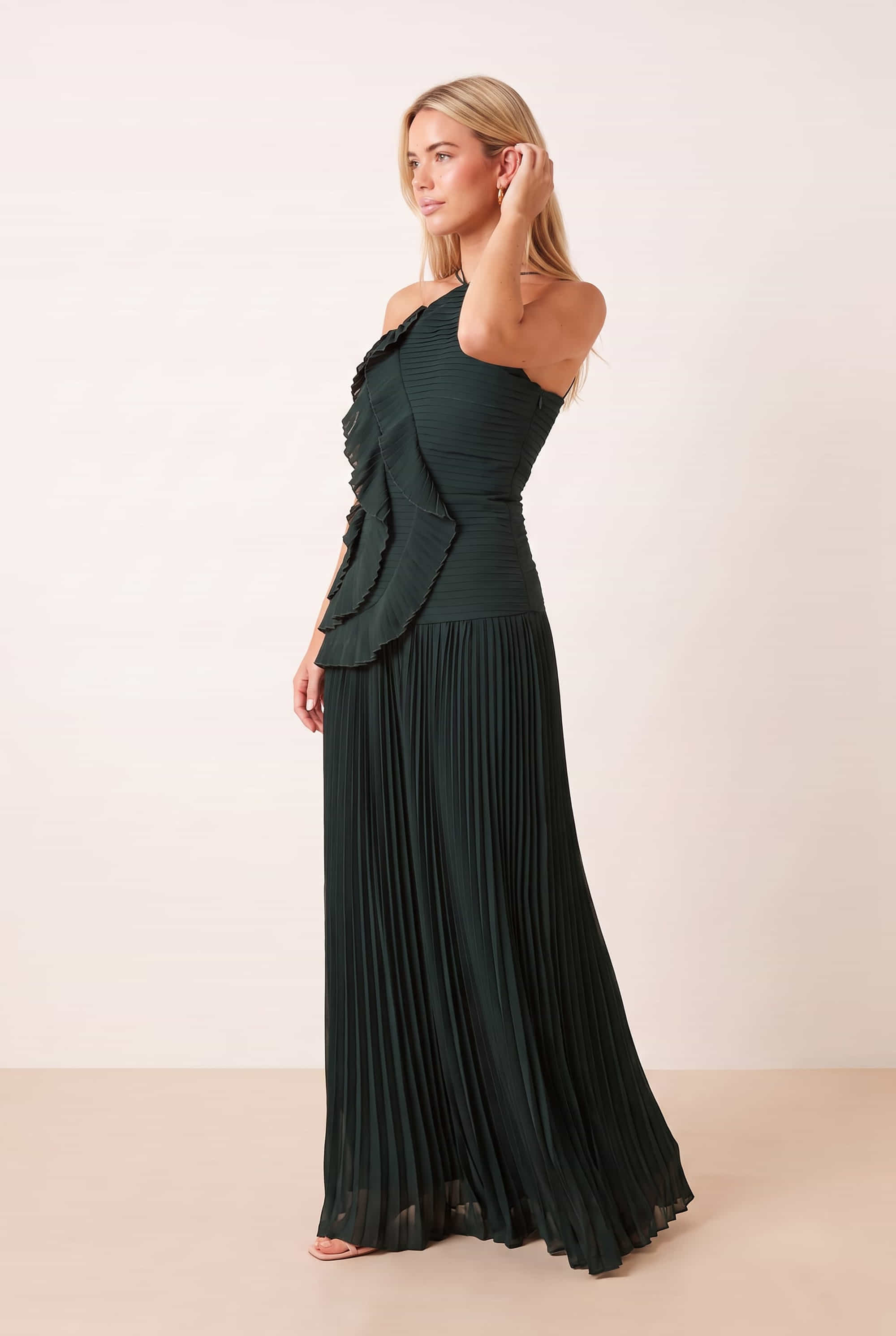 Pleated halter tie dress in Emerald green