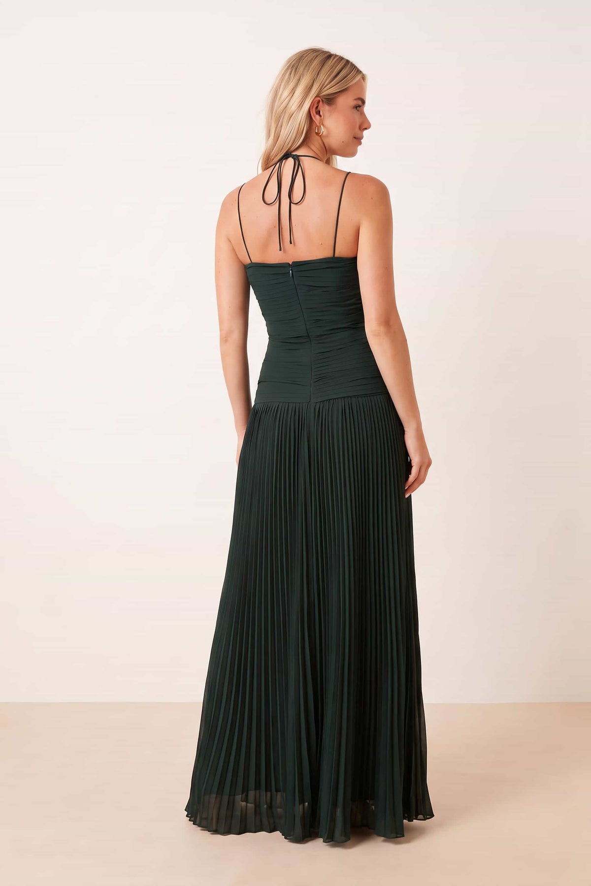 Pleated halter tie dress in Emerald green