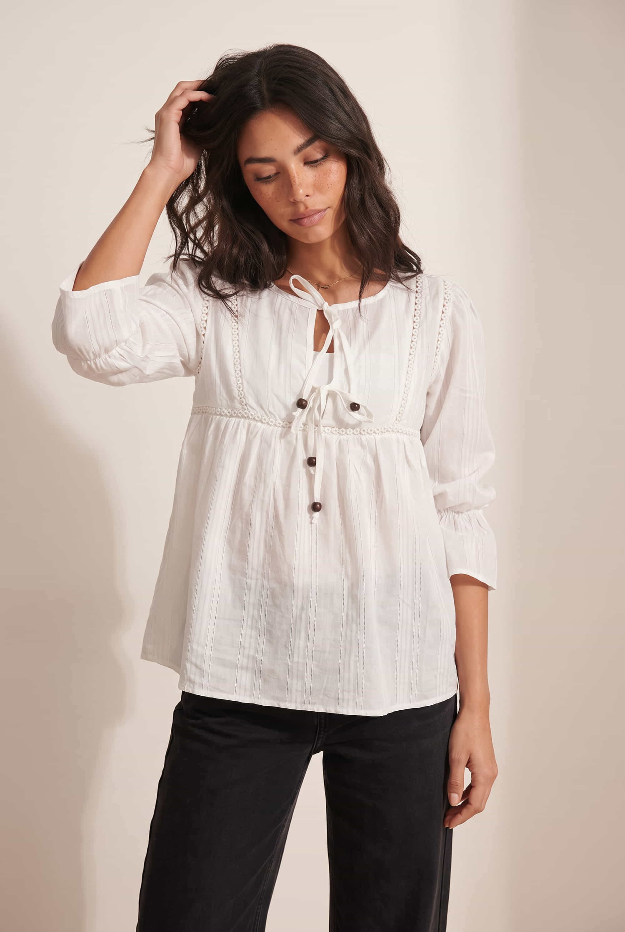 Tiered White Tie Textured Blouse