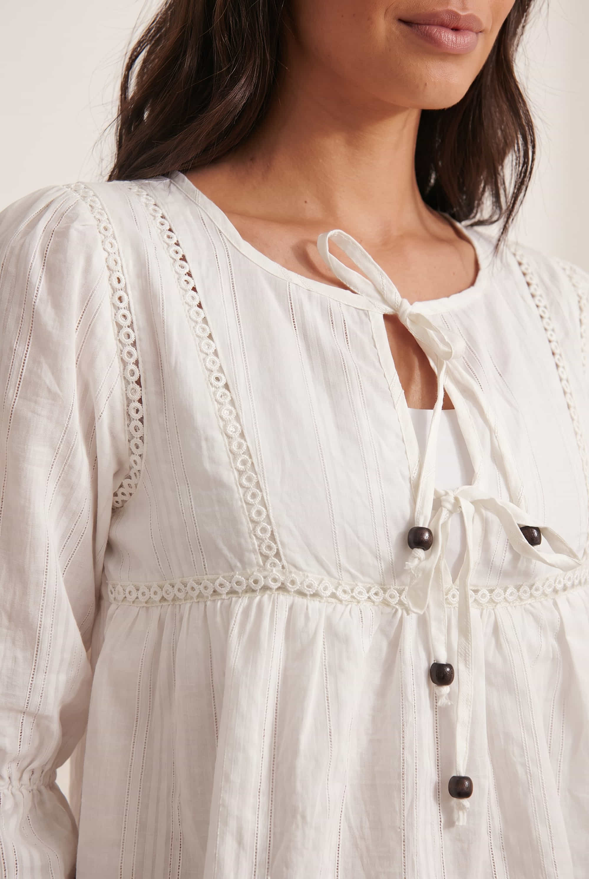 Tiered White Tie Textured Blouse