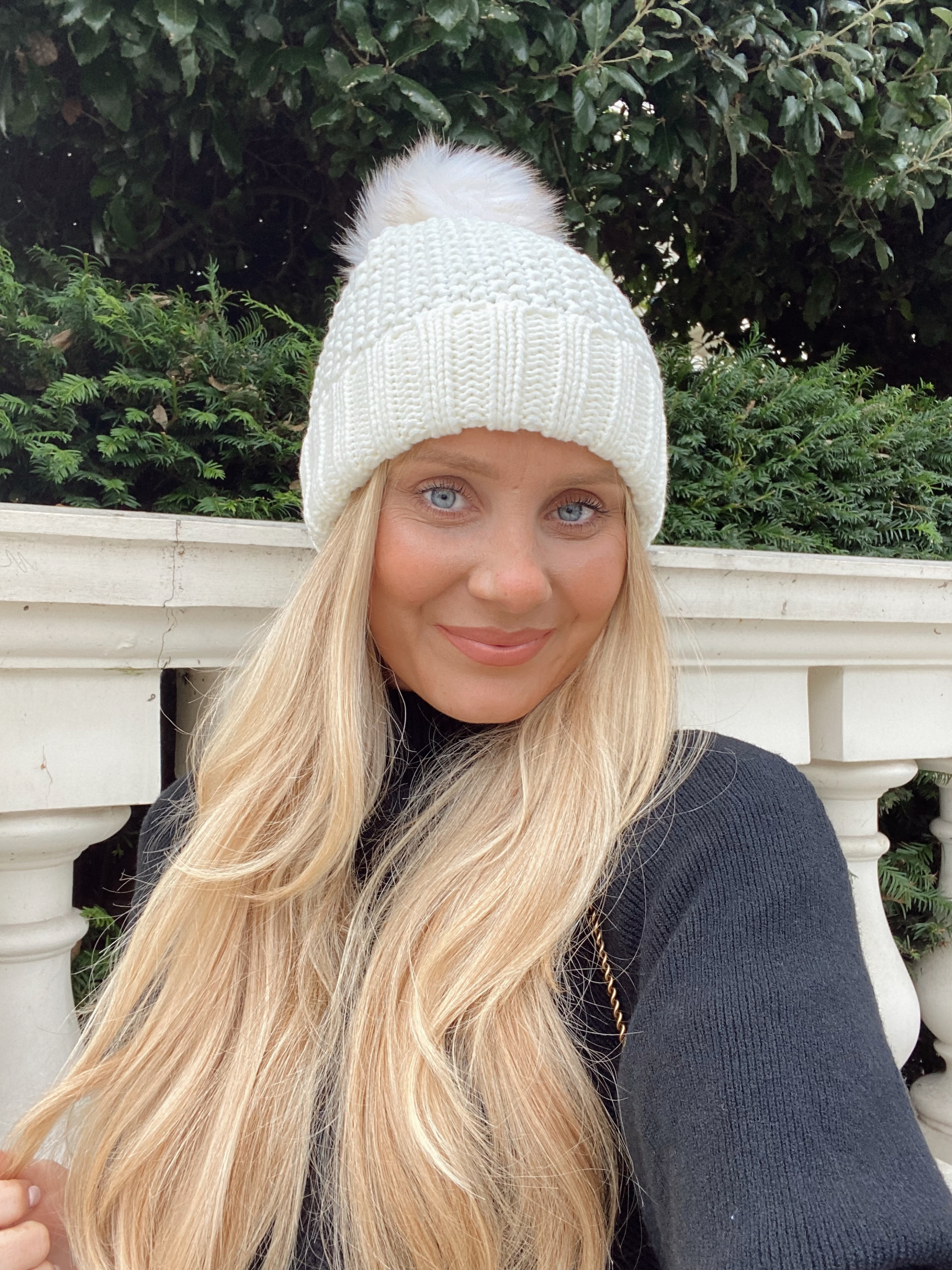 White bobble top hat