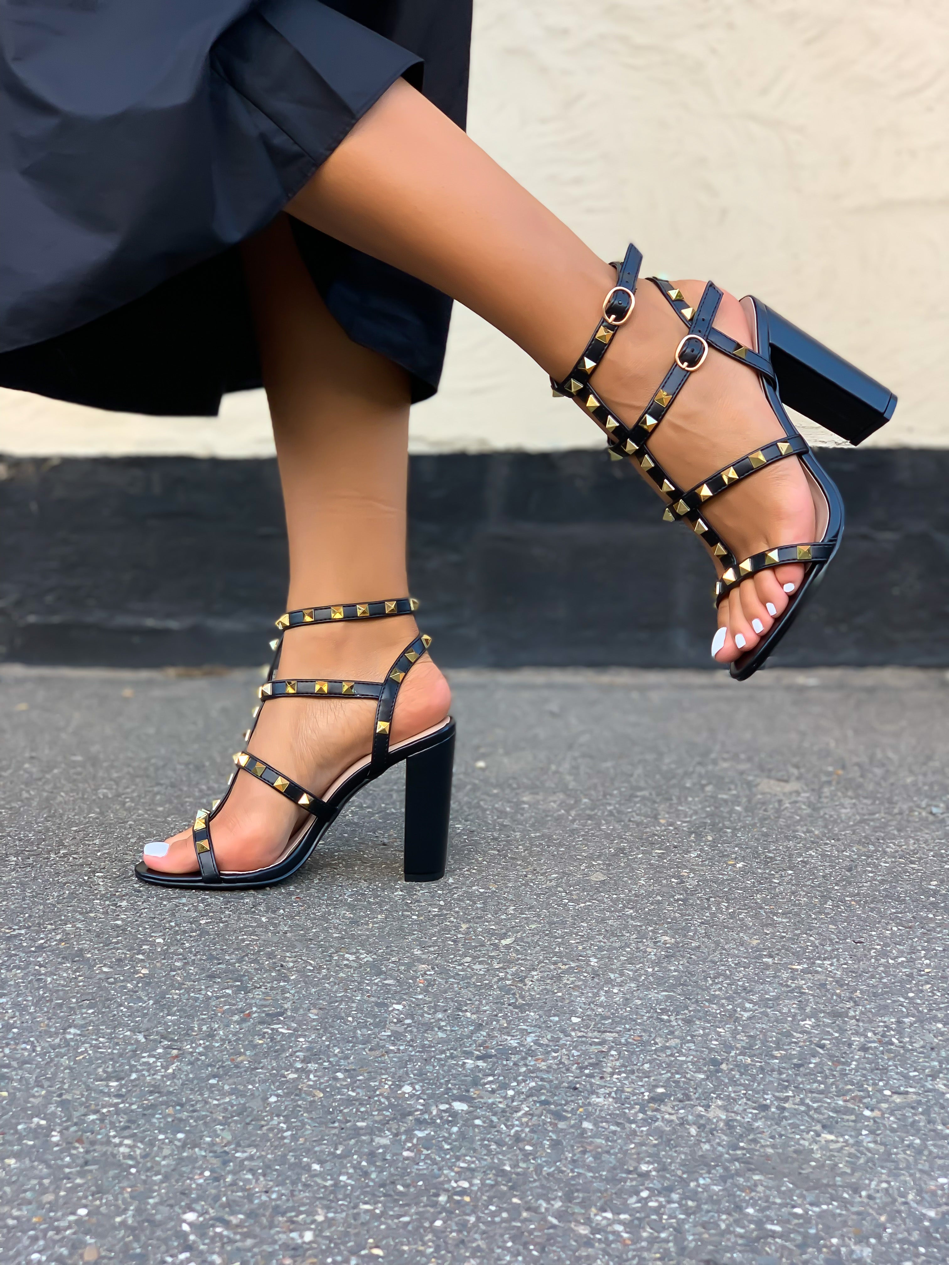 Gold and black heel sale